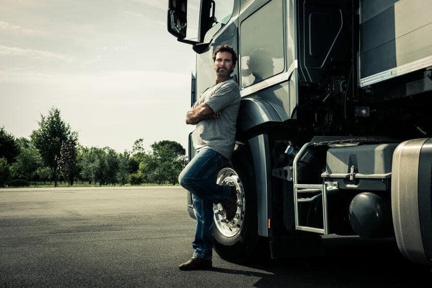 Truck Driver Leaning on his Truck